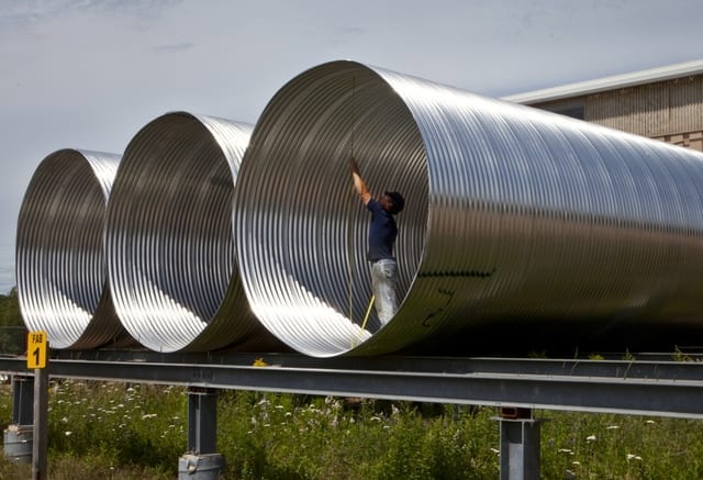 Inspecting corrugated steel pipe